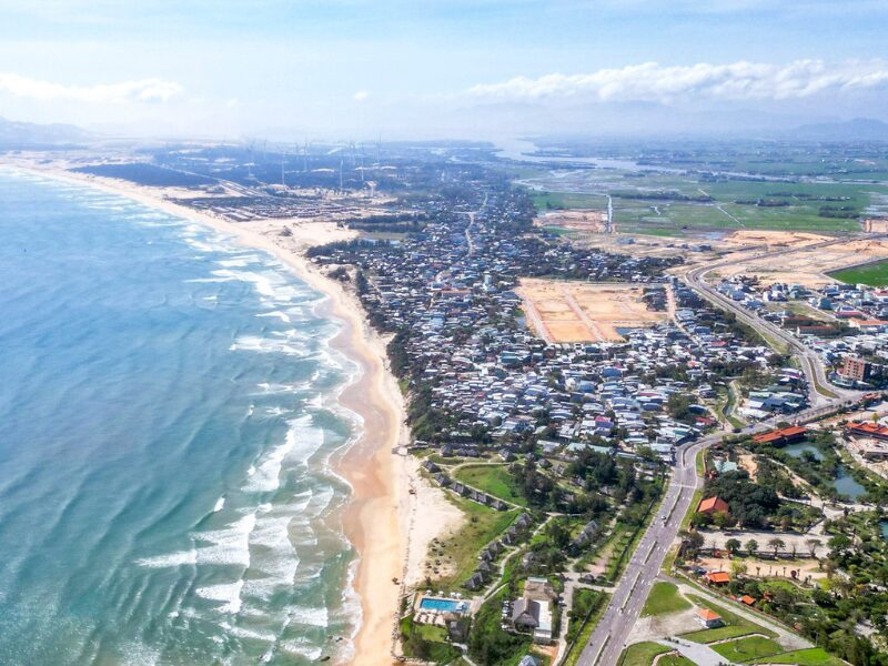 Aerial view of Gia Lai Real Estate Project site showcasing coastal development and urban expansion in Vietnam