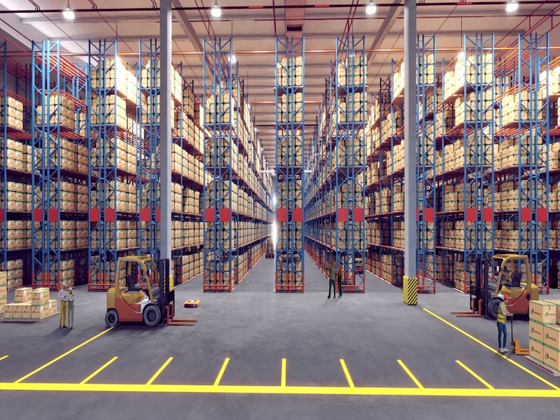 Vietnam logistics real estate warehouse with high shelves, forklifts, and workers in a modern distribution center.